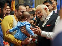 
      
      PM shares glimpse of  special welcome by China's Indian community
      
      