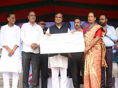 
      
      Assam CM presents cheques worth Rs 32 crore to 31,910 women
      
      