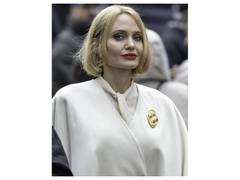 
      
      Angelina Jolie debuts blonde bob during shoot of 'Anxious People'
      
      