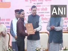 
      
      Uttarakhand CM distributes appointment letters to assistant teach
      
      