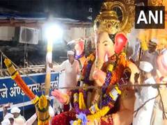 
      
      Mumbai: Lalbaugcha Raja's Lord Ganesh idol immersion procession b
      
      