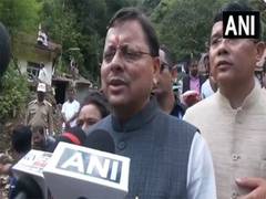 
      
      CM Dhami prioritizes restoration of bridges, roads, and essential
      
      
