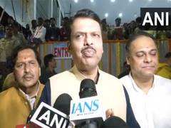 
      
      Maharashtra CM, DyCM shower flowers during Ganpati Visarjan
      
      