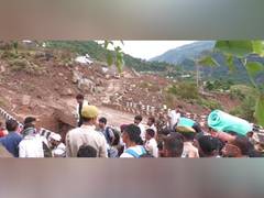 
      
      J-K: Locals navigate routes through makeshift paths
      
      