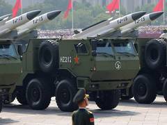 
      
      Missiles reign in Xi's Parade
      
      