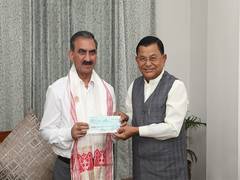 
      
      Assam Minister hands over Rs 5 crore cheque to Himachal CM 
      
      