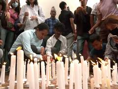 
      
      Nepal citizens hold candlelight vigil at Bouddhanath Stupa 
      
      