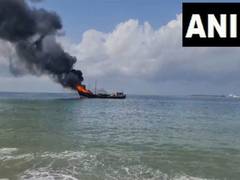 
      
      Gujarat: Ship anchored at Porbandar Subhashnagar Jetty catches fi
      
      