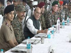
      
      Rajnath Singh attends ‘Barakhana’ with soldiers in Bhuj
      
      