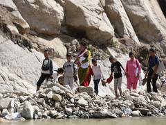 
      
      Nepal downpour blocks highways, travellers ‘cling to wall’
      
      