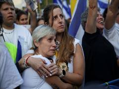 
      
      First seven Israeli hostages freed, reunited with families after 
      
      
