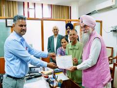 
      
      Certificate of Election handed to RS candidate Rajinder Gup ta
      
      