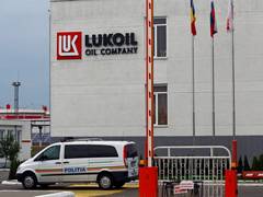 
      
      After US sanctions, Russia’s Lukoil to sell overseas assets
      
      