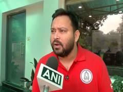 
      
      Tejashwi Yadav promises additional Rs 300 for paddy, Rs 400 for w
      
      