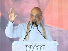
      
      Amit Shah accuses Congress of sheltering 