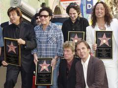 
      
      Journey to stop making music as a band 
      
      