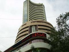 
      
      Markets open flat amid positive global cues 
      
      