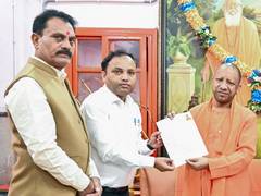 
      
      Uttar Pradesh CM Yogi Adityanath fills enumeration form under SIR
      
      