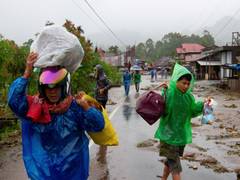 
      
      Indonesia landslides, deluge kill 34, rescue hampered
      
      