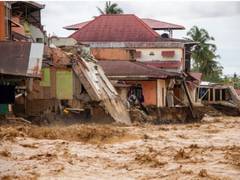 
      
      Indonesia battles deadly floods: 248 dead, over 100 missing
      
      