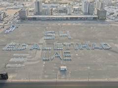 
      
      Ajman secures Guinness World Record with 603-vehicle formation of
      
      