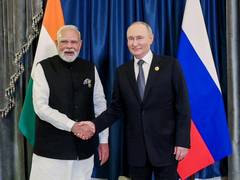 
      
      Modest outcome of Putin’s visit will secure oil and defence
      
      