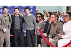 
      
      Jonas Brothers honoured at hand, footprint ceremony
      
      