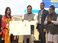 
      
      Assam CM presents scooters to students
      
      