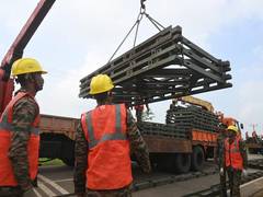 
      
      Indian Army accelerates bridge restoration in Sri Lanka
      
      