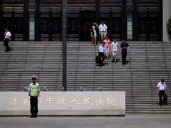 
      
      China executes financer on graft charges
      
      