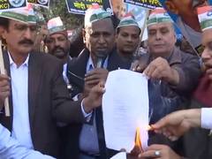 
      
      Congress Leader burns copies of VB-G Ram G Bill In
      
      