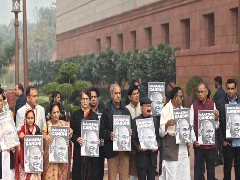 
      
      Members of the opposition stage protest against VB G-RAM-G Bill
      
      