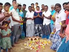 
      
      DMK members hold a memorial event for lives lost in 2004 tsunami
      
      