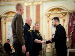 
      
      Zelenskyy presents housing certificates to security personnel
      
      