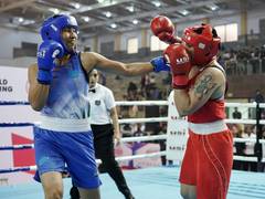 
      
      Senior National Boxing: Pooja Rani, Jadumani Singh win easy
      
      