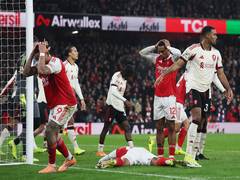 
      
      Premier League: Arsenal held to goalless draw by Liverpool
      
      