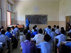 
      
      Afghan students forced to attend school under sky
      
      