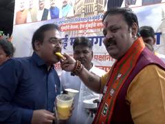 
      
      BJP-Sena Yuti takes huge lead in BMC, distributes rasmalai
      
      