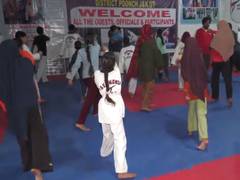 
      
      J-K: Girls participate in a self-defence training programme
      
      