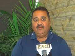 
      
      Virat Kohli's coach Rajkumar Sharma applauds his hundred
      
      