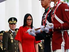 
      
      Venezuela’s police and military pledge loyalty to President Delcy
      
      