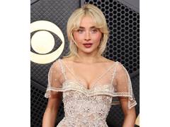 
      
      Grammy 2026: Sabrina Carpenter turns heads in ruffled gown
      
      