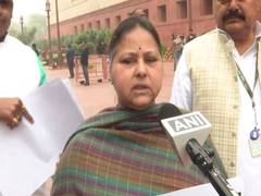 
      
      RJD MPs protest in Parliament over special status, law and order
      
      