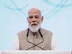 
      
      PM Modi distributes land deeds to tea garden workers in Assam
      
      