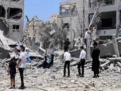 
      
      New wave of Iranian missiles targets central Israel
      
      