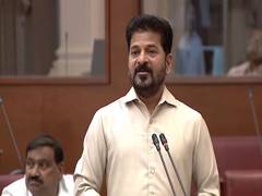 
      
      Revanth Reddy hands over Rs 1 crore insurance cheques
      
      
