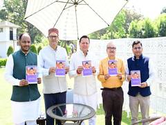 
      
      Uttarakhand CM Dhami unveils Panchang table calendar
      
      