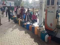 
      
      UP: People queue for fuel with canisters in Lakhimpur Kheri
      
      