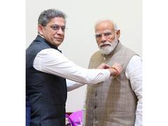 
      
      PM Modi honoured with Merchant Navy miniature flag
      
      
