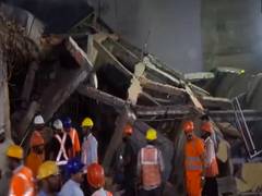 
      
      MP: Several feared trapped after four-storey building collapses
      
      